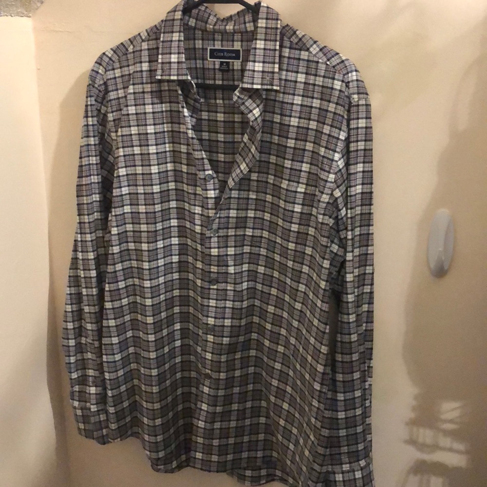 Button up plaid/tartan shirt.